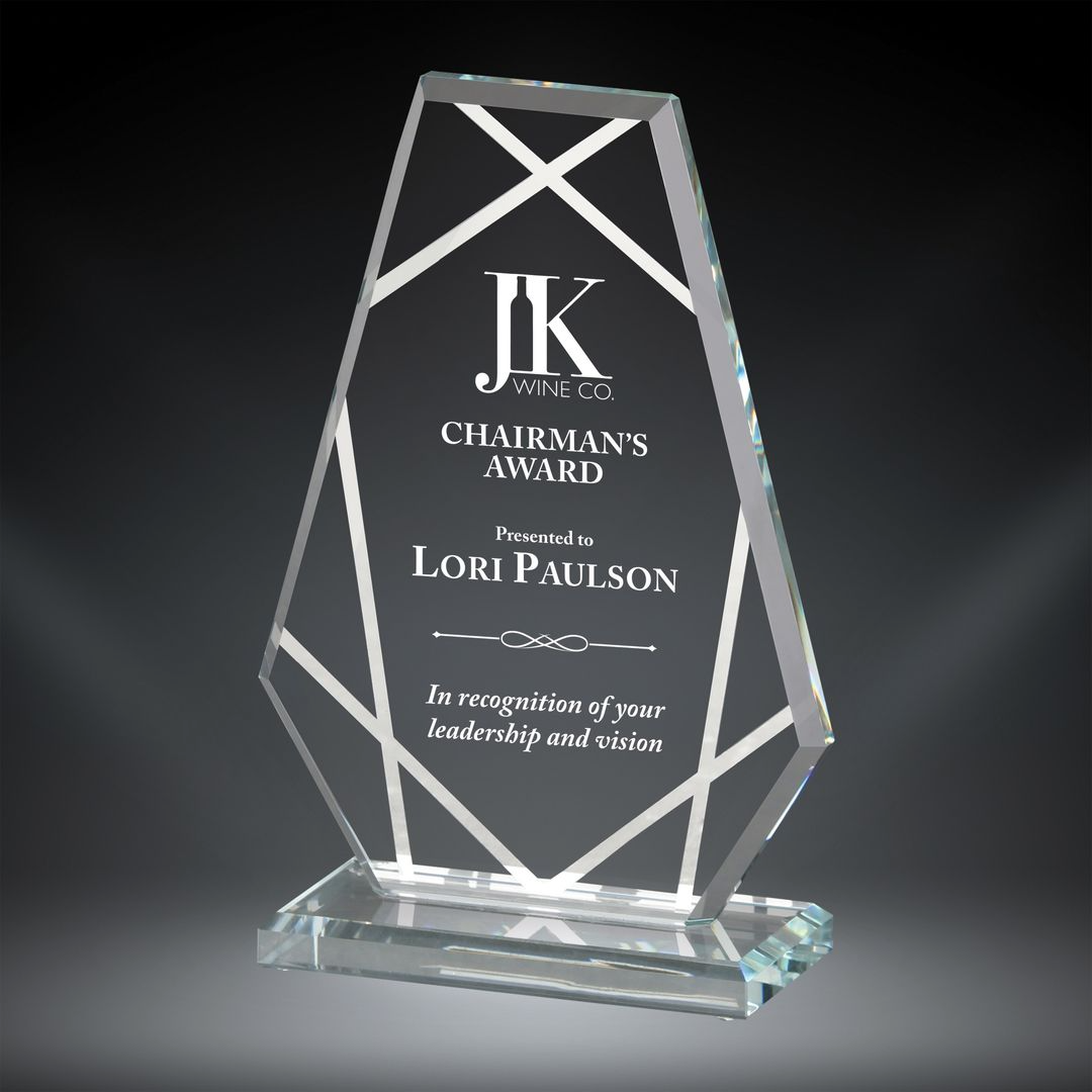 Our Contour Tower Glass Award features a glass piece with beveled edges and contour lines on the outside of the award. The middle area is for laser engraving and this one is personalized with a company logo and words of appreciation for the recipient. This glass award comes in 3 sizes to choose from, all of which come in a deluxe gift box not shown in this photo. It's mounted on a glass base that matched the standing part of the award.