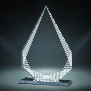 Our Rayado Diamond Glass Award features a diamond shaped piece of glass with a lined design around the border and a middle area for laser engraving personalization. It's mounted on a clear glass base for stability. This 76708 is 8.5" in size and comes in a deluxe gift box.