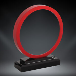 Our Red Stargate Glass Award features a round piece of glass with a red border. The glass circle is mounted on a black glass base. This 76227-R 6" x 7" in size and comes in a deluxe gift box.