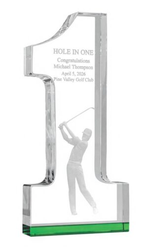 Our Hole In One Trophy features a crystal piece made in the shape of a #1. The bottom of the award has a green accent, the middle has a 3-D Golfer and the top is for laser engraving personalization. This one is personalized for Michael Thompson for hitting a Hole In One on April 5th, 2026 at Pine Valley Golf Club. This CRY1093 golf trophy is 4.25" x 13.25" in size & weighs 5.5 lbs.