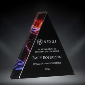 Our Prism Triangle Award shown here on a lighted black background. It features a thick acrylic triangle with a black area for laser engraving personalization and a colorful prismatic accent on the left side of the triangle. This award comes in 3 sizes to choose from, all of which include free engraving.