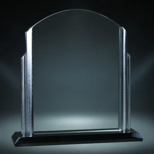 Our Riviera Arch Glass Award features an arched topped piece of glass sitting between two silver decorative brackets on the side. It's mounted and stood on a black glass base. This 71907 glass award is 6.75" x 7.25" in size and is packaged in a deluxe gift box.