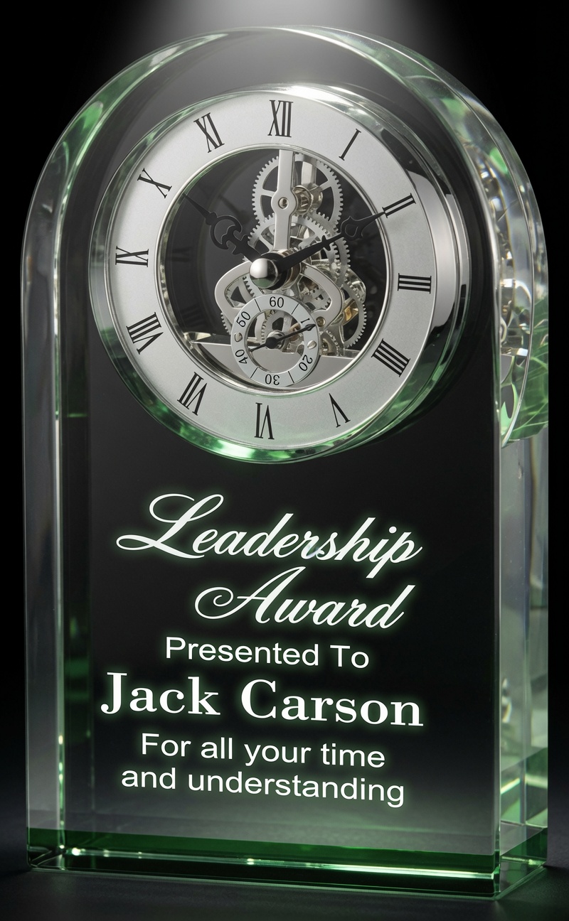 Our Emerald Dome Crystal Clock features a 2.5" thick piece of crystal with a dome at the top & a reflective green mirror base. The top has a silver skeleton clock with black Roman numerals, hands & accents. Below is an area for laser engraving personalization. This CRY951 clock is 5" x 7" in size and weighs 5 lbs.