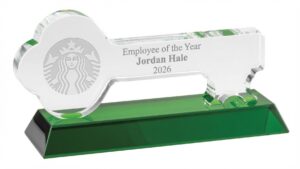 Our Green Accent Crystal Key features a clear crystal key mounted on a green crystal base. The key is for laser engraving and is actually laser engraved for an Employee of the Year Award given out by Starbucks. This CRY1057 crystal key is10" x 4.75" in size and weighs over 4 lbs.
