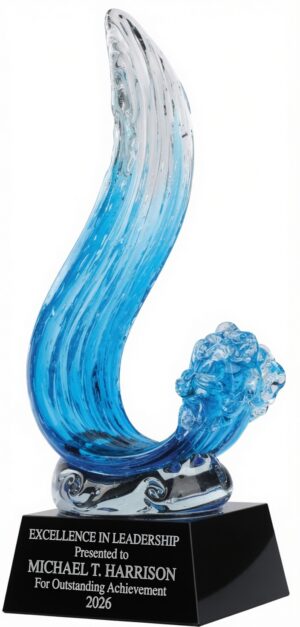 Our Rising Wave Art Glass Award features a rising tidal wave art glass piece mounted on a black glass base. The base includes an engraving plate for personalization. This GLSC100 is 4.25" x 11.75" in size & weighs 8.8 lbs.